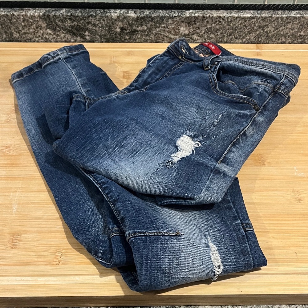 Distressed Blue Jeans